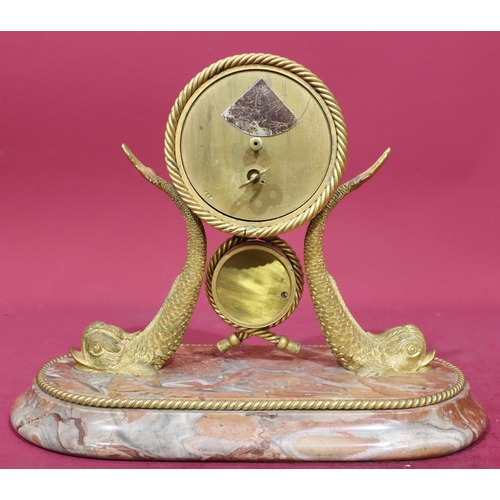 920 - A 19th Century ormolu timepiece with separate barometer supported by 2 fish with allover rope style ... 