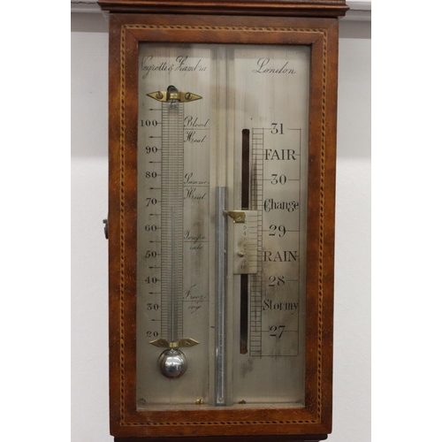 921 - Negretti & Zanbar, London, Edwardian mahogany stick barometer with thermometer, inlaid boxing, 101cm... 