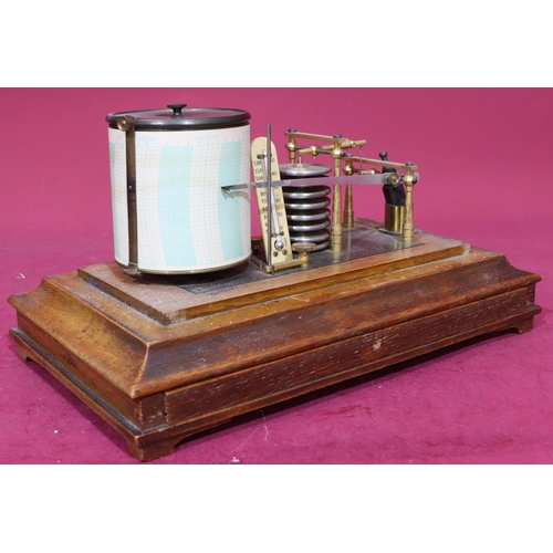 923 - An oak barograph with bevelled glass top on sides with 1 long drawer on bracket feet, 36cm wide