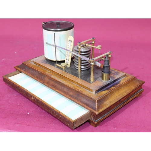 923 - An oak barograph with bevelled glass top on sides with 1 long drawer on bracket feet, 36cm wide