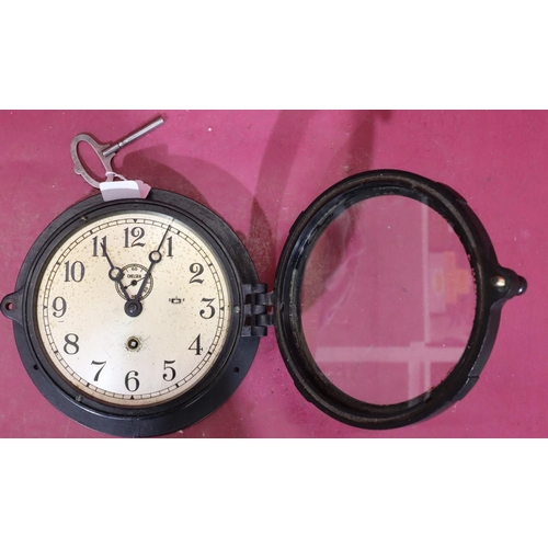 925 - Chelsea Co., Boston, black circular hanging wall clock with silvered dial, seconds dial and Arabic n... 