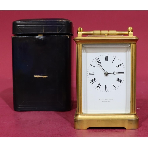 927 - Alfred Russell & Co, Liverpool brass half-striking repeat carriage clock with white enamel dial and ... 