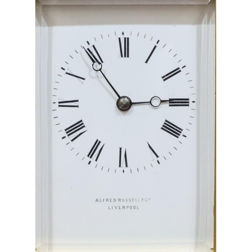 927 - Alfred Russell & Co, Liverpool brass half-striking repeat carriage clock with white enamel dial and ... 