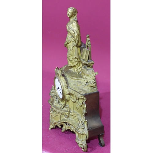 928 - A gilt Spelter 8-day striking mantel clock with raised female figure motif to top, allover raised sw... 