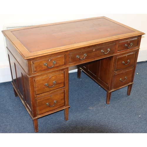 936 - A 1930's mahogany kneehole double pedestal desk with brown leather inset top, centre drop flanked by... 