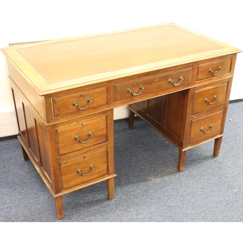 936 - A 1930's mahogany kneehole double pedestal desk with brown leather inset top, centre drop flanked by... 