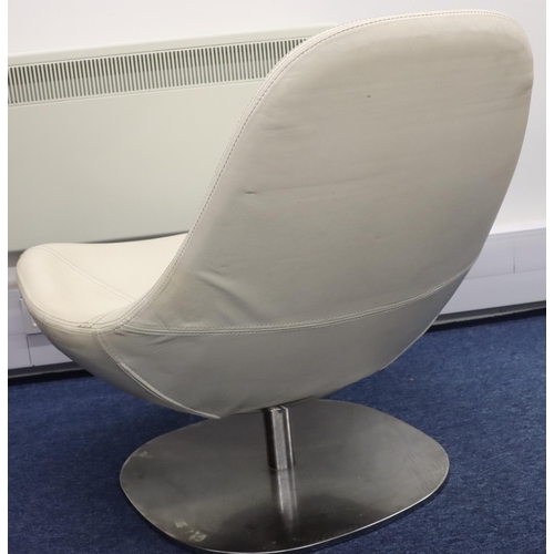 941 - A white leather 70's swivel tub chair on stainless steel base, seat 77cm wide, 77cm high