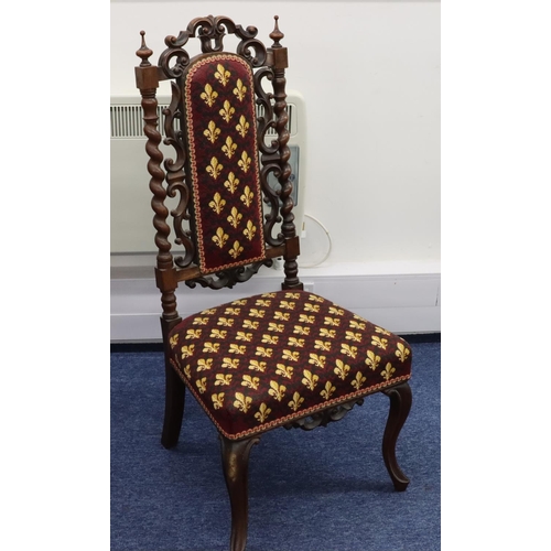 944 - A Victorian walnut nursing chair with barley twist and scroll back, overstuffed seat and part panell... 