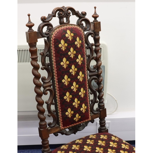 944 - A Victorian walnut nursing chair with barley twist and scroll back, overstuffed seat and part panell... 