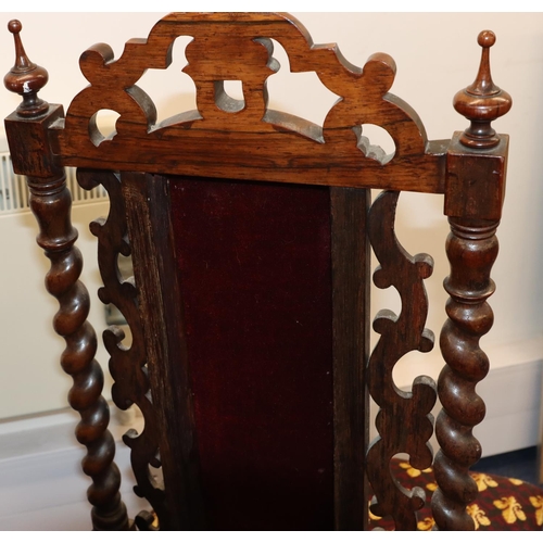 944 - A Victorian walnut nursing chair with barley twist and scroll back, overstuffed seat and part panell... 