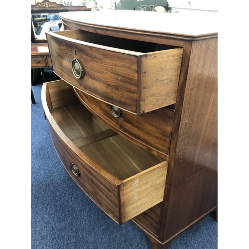 952 - A 19th century mahogany bow fronted chest of drawers (cut) 2 short 3 long graduated drawers on splay... 