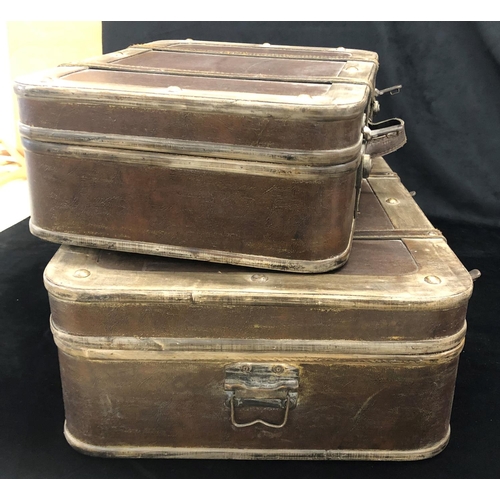 2042 - A pair of brown leather suitcases with wood trim, largest with metal handles, both with locks (no ke... 