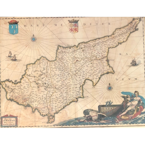 2075 - A coloured map of Cyprus, 52.5cm x 42.5cm, in wood frame.