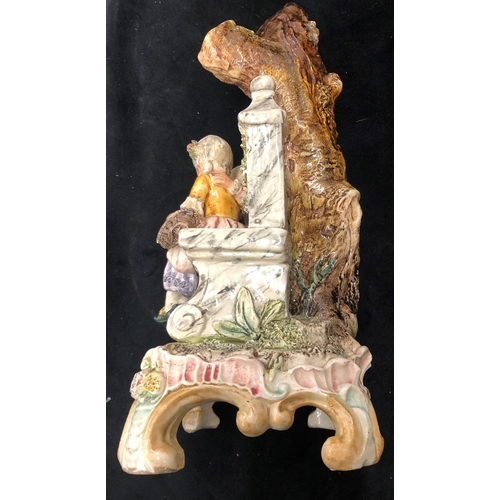 2086 - A china ornament of a couple seated on a bench, 34cm high, a pair of green vases 14.5cm high  and a ... 