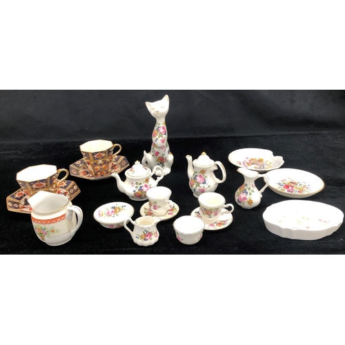 2090 - A pair of Imari patterned cups and saucers, a Noritake small jug, a Chelson china miniature tea set ... 