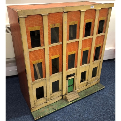 2094 - A large 19/20th Century dolls house with 2 hinged opening doors enclosing 3 floors, 92 wide, 52 deep... 