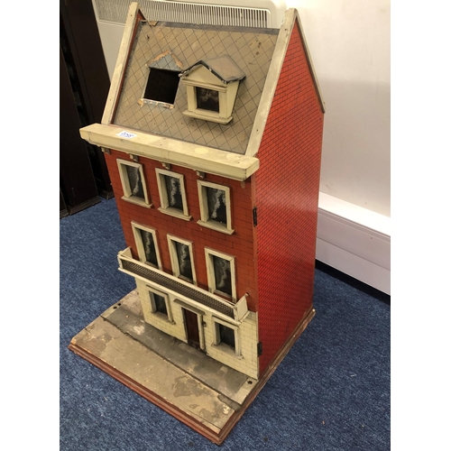 2095 - A smaller 19/20th Century dolls house with single door enclosing 3 floors, on wood plinth, 49cm wide... 