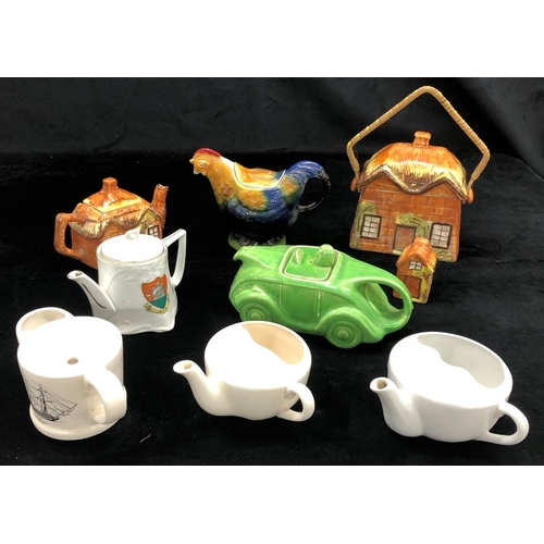 2099 - A green car shaped Sadler novelty teapot, various other teapots etc.