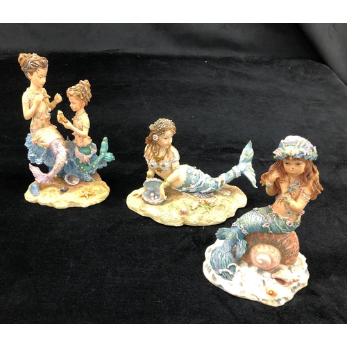 2100 - 3 limited edition Dream Time mermaids, a small Delft jug and various other small jugs and figurines.