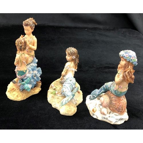 2100 - 3 limited edition Dream Time mermaids, a small Delft jug and various other small jugs and figurines.