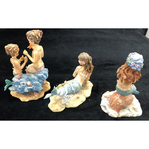 2100 - 3 limited edition Dream Time mermaids, a small Delft jug and various other small jugs and figurines.