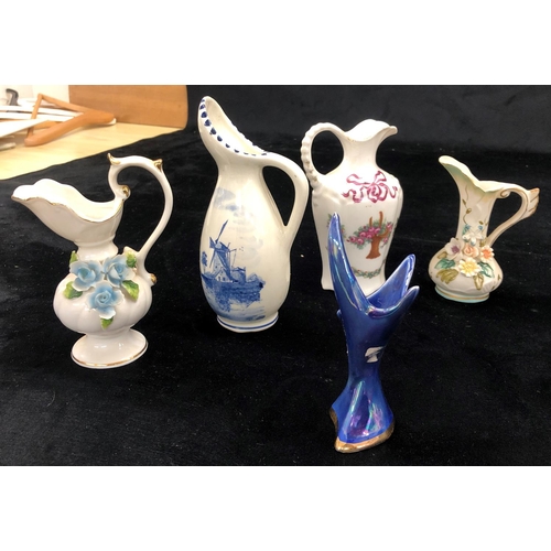 2100 - 3 limited edition Dream Time mermaids, a small Delft jug and various other small jugs and figurines.