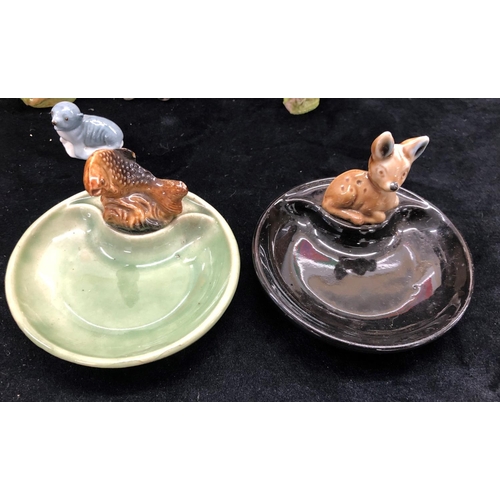 2102 - 2 Irish Wade small dishes. a Beswick cat and a quantity of other animal figures etc.