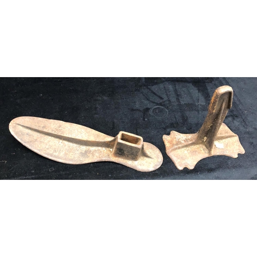 2107 - A cast iron Blakeys cobbler shoe last, a quantity of brass and various novelty key rings.