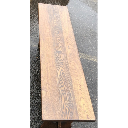 2138 - A 20th Century oak trestle bench, 137cm long, 35.5cm deep, 45cm high. This Lot is not held by PF Win... 