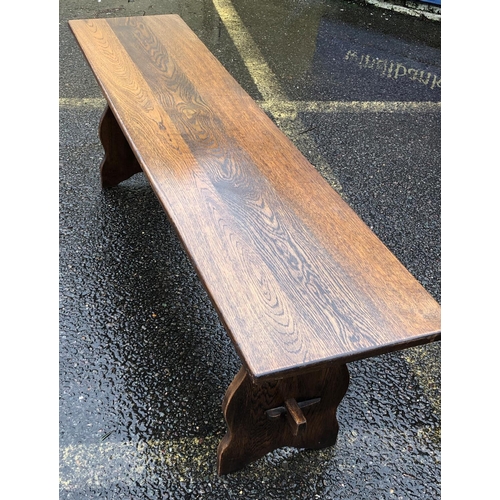 2138 - A 20th Century oak trestle bench, 137cm long, 35.5cm deep, 45cm high. This Lot is not held by PF Win... 