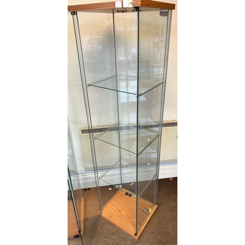 2149 - A pair of modern glass display cabinets with glass shelves, locks, hole to top of 1 cabinet for ligh... 