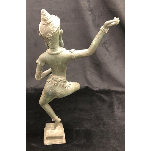 2152 - An Eastern spelter figure of a dancer on square base, 47cm high overall.