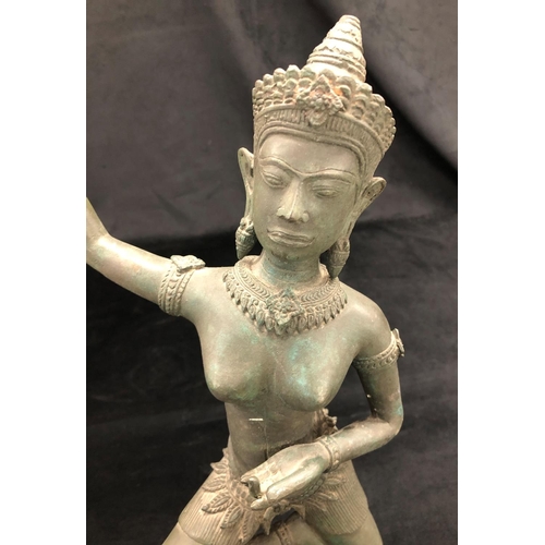 2152 - An Eastern spelter figure of a dancer on square base, 47cm high overall.