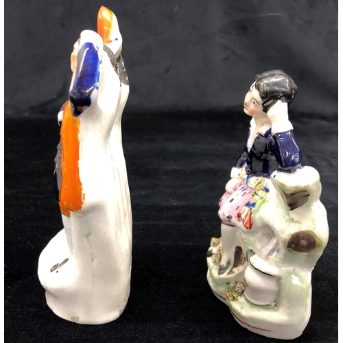 2156 - A pair of Victorian Staffordshire figures, tallest 17cm high.