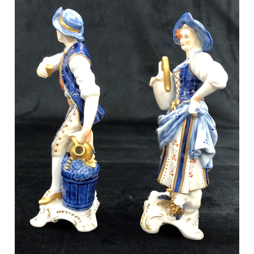 2158 - 2 Continental china figures of lady and gentleman carrying water jugs, tallest 18cm high.