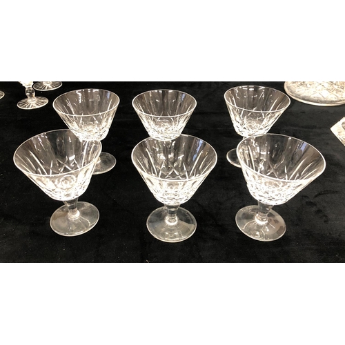 2162 - A cut glass decanter, a scent bottle  5 large wine glasses, and various other glasses.