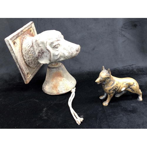 2182 - A brass Alsatian dog 11.5cm high, 17cm long and an iron doorbell with dog's head on square mount 12c... 