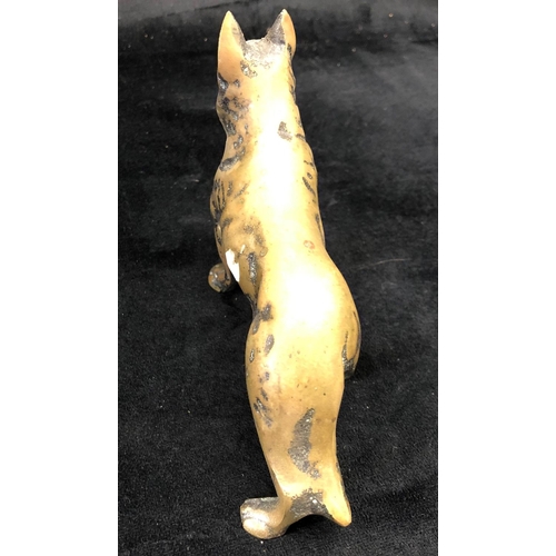 2182 - A brass Alsatian dog 11.5cm high, 17cm long and an iron doorbell with dog's head on square mount 12c... 