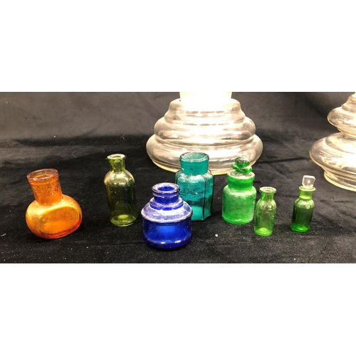 2191 - 2 glass jars with stoppers and 7 small miniature glass bottles.