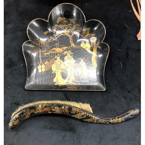 2200 - An Oriental black lacquered table dustpan and brush a lacquered shell shaped dish etc.