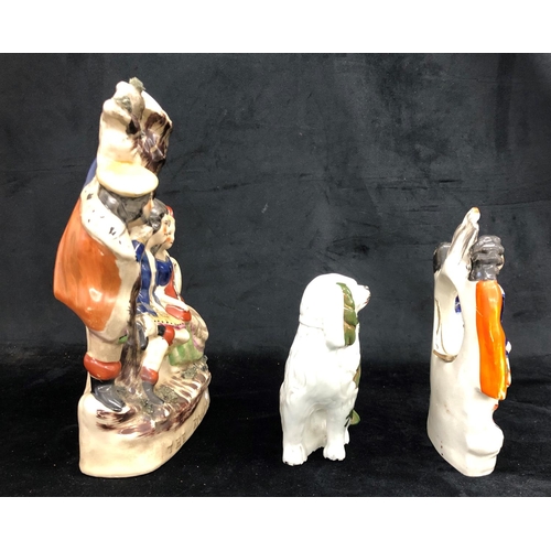 2212 - A small Staffordshire dog, 15cm high, a Staffordshire group of 2 girls with hole for clock (damaged)... 