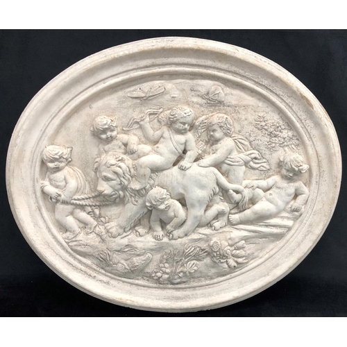 2218 - A heavy stone effect oval plaque depicting a lion and cherubs, 59cm x 49cm.