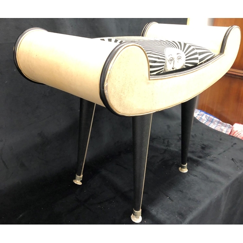 2219 - A vintage stool with white leather effect seat with metal edging and black and white padded cushion,... 