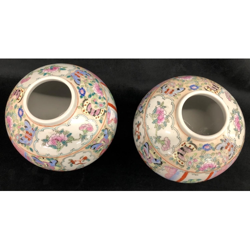 2240 - A pair of Oriental vases 18cm high and 4 Chinese plates 23cm diameter.