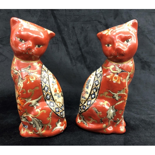 2241 - A pair of Oriental cats, stamped to base 18cm high, 2  Oriental cats on white glaze with multi-colou... 