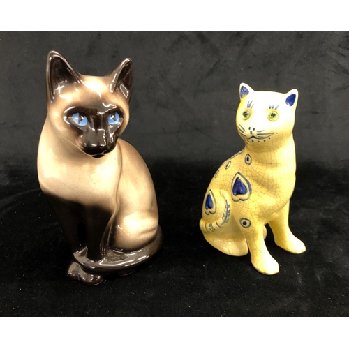 2241 - A pair of Oriental cats, stamped to base 18cm high, 2  Oriental cats on white glaze with multi-colou... 