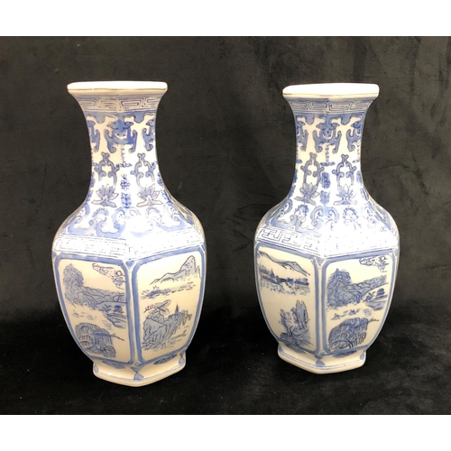 2242 - A pair of blue and white Oriental vases, 36cm high.