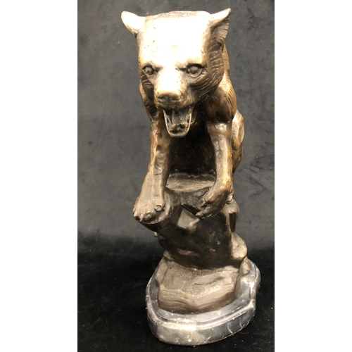 2255 - A heavy bronze figure of a roaring bear on marble base,  35cm high overall.