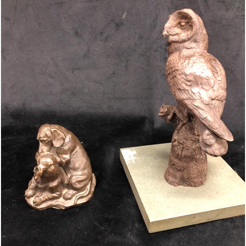 2256 - A composition Heredities Limited owl, 22cm high and a composition group of 2 dogs playing10.5cm high... 