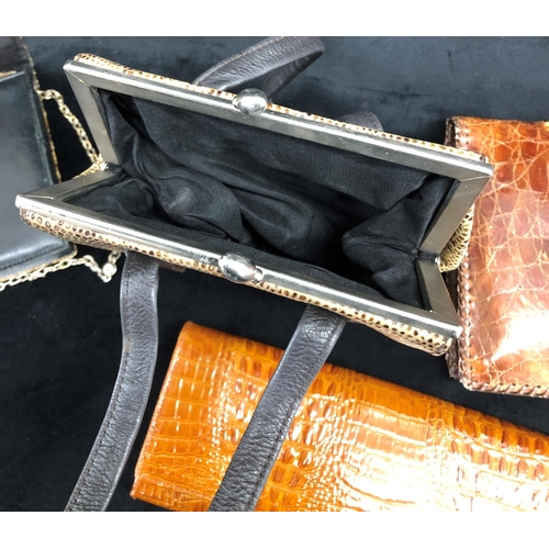 2257 - A Pierre Cardin crocodile skin handbag, 3 other crocodile skin clutch bags and a snakeskin effect ha... 